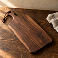 Handcrafted Walnut Serving Board — AI-generated sample image